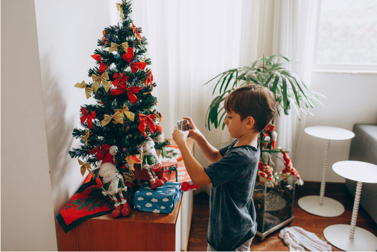 The Christmas Spirit with a Small White Christmas Tree